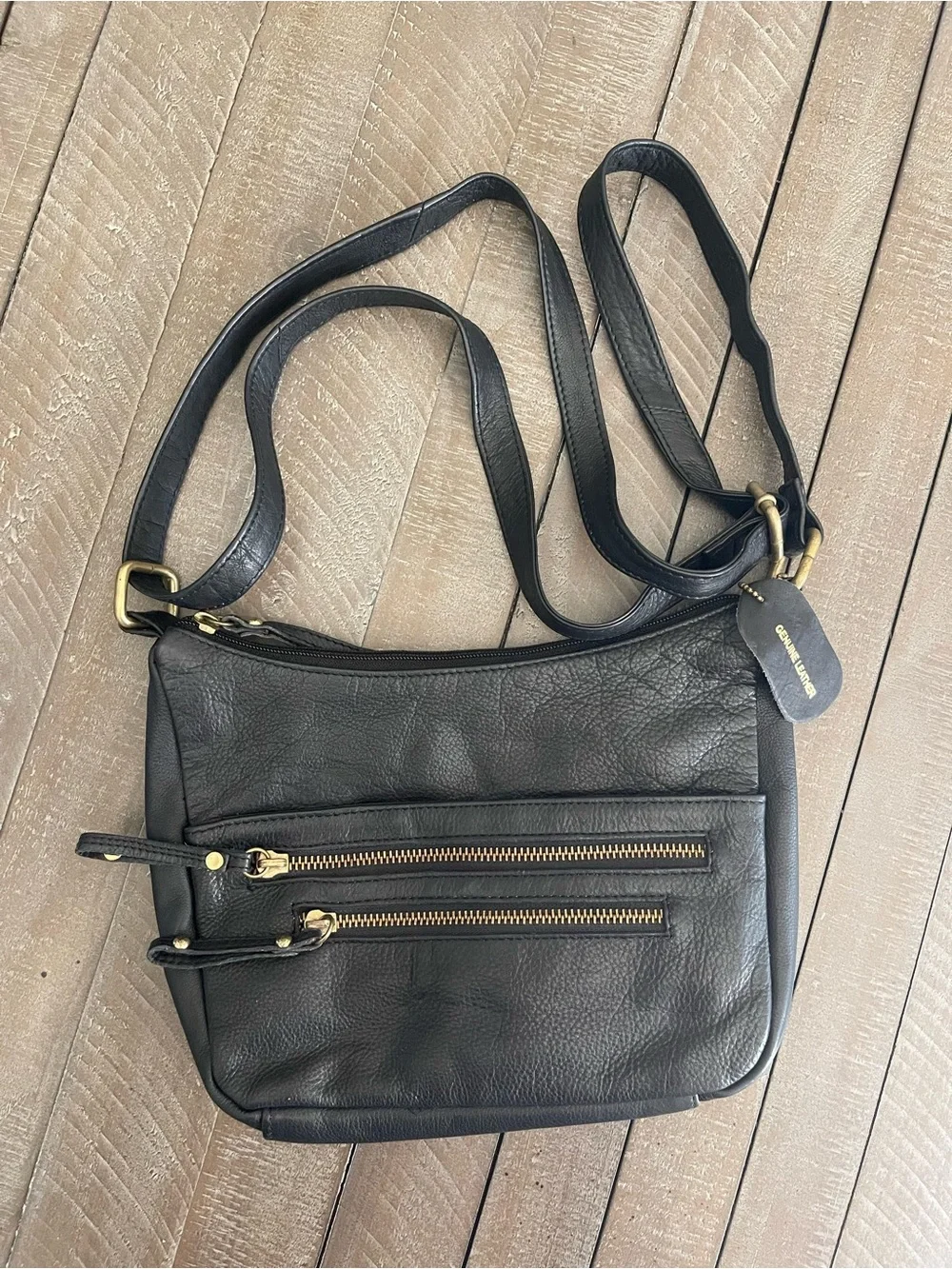 Black Leather Crossbody Bag with Front Zip Pockets and Gold Accents